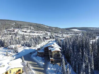 an aerial view of a resort in the snow at Kookaburra Lodge #202 By Bear Country in Sun Peaks