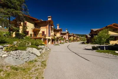 a street in front of a row of houses at Trails Edge #25 By Bear Country in Sun Peaks