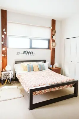 a bedroom with a large bed in a room at Pacific Soul Eco-Luxe Vacation Home in Ucluelet