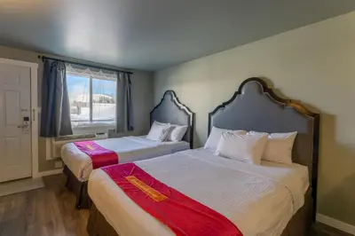 a bedroom with two beds and a window at Ace Motel in Princeton