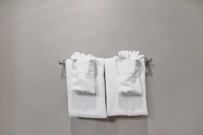 two towels hanging on a towel rack in a bathroom at Whistler Blackcomb Vacation Rentals - Village North in Whistler