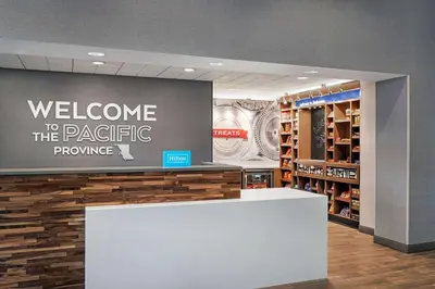 a welcome to the pacific province sign in a store at Hampton Inn & Suites Kelowna, British Columbia, Canada in Kelowna
