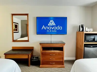 aania sign on a wall in a hotel room at Anavada Inn & Suites - Prince George in Prince George