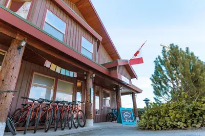 a group of bikes parked outside of a building at Whalers Guesthouse in Tofino