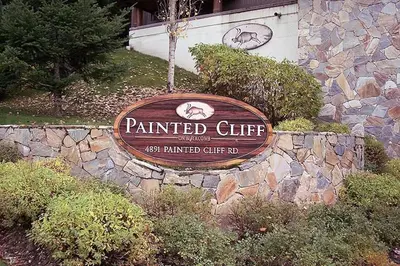 a sign for aanted club in front of a building at Painted Cliff by Whistler Premier in Whistler