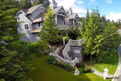 an aerial view of a large house with a staircase at Treeline Townhome by Whistler Premier in Whistler