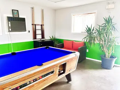 a billiard room with a pool table in it at The Orchard at Oliver in Oliver