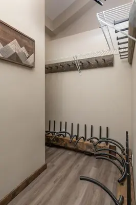 an empty room with a row of pipes on the wall at Summit View in Valemount