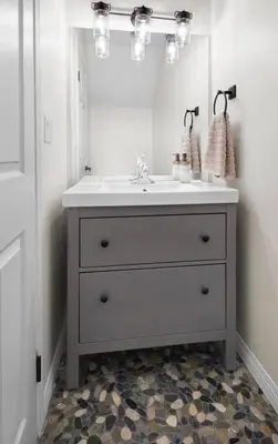 a bathroom with a sink and a mirror at Mountain Gate - Pet Friendly 2BR w Mountain Views and open hot tub in Canmore