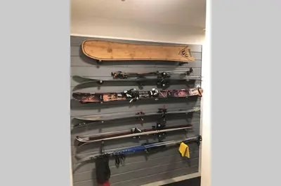 a room with a skateboard on a wall at Mountain Edge Ski-in Ski-out Condo in Kimberley