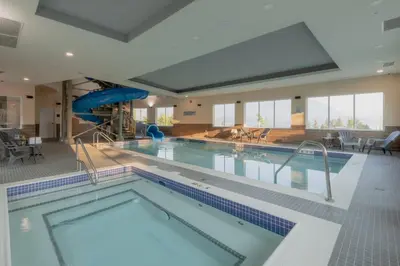 a large indoor pool with a large swimming pool at Fairfield Inn & Suites by Marriott Salmon Arm in Salmon Arm