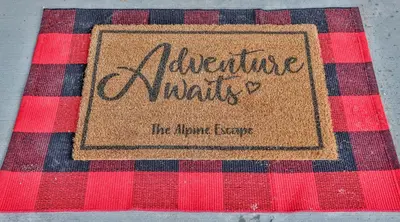 a napkin with a sign on top of a table at The Alpine Escape by Samsara Resort Top View Downtown 4BR & 3BTH in Canmore