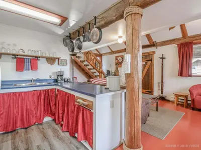 a kitchen with a counter top in a room at Woods End Landing in Bamfield