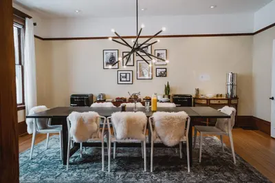 a dining room with a table and chairs at The Copeland in Revelstoke
