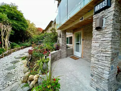 a building with a sign on the side of it at Resort style home living in Delta