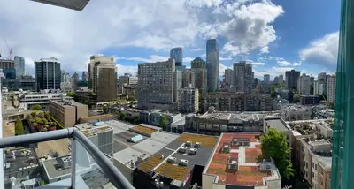 a view of a city skyline with tall buildings at Your Vacation Home Downtown Vancouver in Vancouver