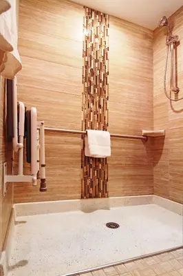 a bathroom with a shower and a bathtub with a shower at Holiday Inn Express and Suites Calgary University by IHG in Calgary