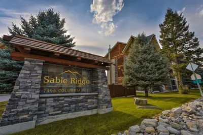 a sign for a sauble ridgeres caulking yard at Sable Ridge Condos by StayIn in Radium Hot Springs