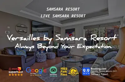 a living room with couches and a sign that says live samsara resort at The Versailles by Samsara Resort Top Luxury Top View 1300SQF 2BEDROOM 2BATHROM in Canmore