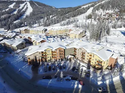 an aerial view of a resort in the snow at Fireside Lodge #215 by Bear Country in Sun Peaks