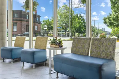 two chairs and a table in front of a window at WorldMark Victoria in Victoria
