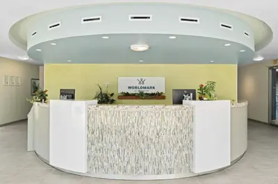 a lobby with a reception desk in a building at WorldMark Victoria in Victoria