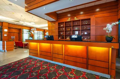 a lobby of a hotel with a reception desk at Grand Park Hotel Vancouver Airport, an Ascend Collection Hotel in Richmond
