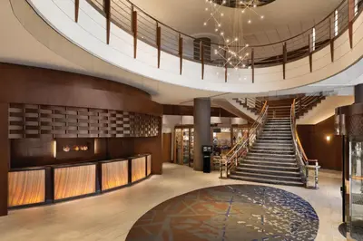 a spiral staircase in a building with a lobby at Radisson Hotel Vancouver Airport in Richmond