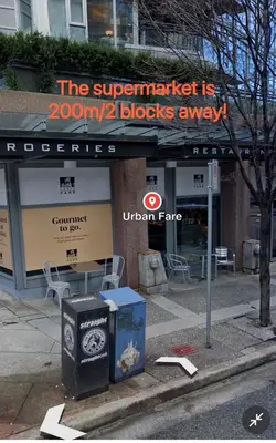 a sign that says the supermarket is zoom blocks away at Best Location Downtown Chic Suites in Vancouver