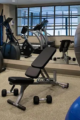 a gym with several exercise bikes in a room at Delta Hotels by Marriott Whistler Village Suites in Whistler