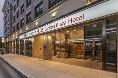 a store front of a plaza hotel on a street at BEST WESTERN PLUS Carlton Plaza Hotel in Victoria