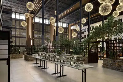 a row of tables in a building with lights at Wyndham Edmonton Hotel and Conference Centre in Edmonton
