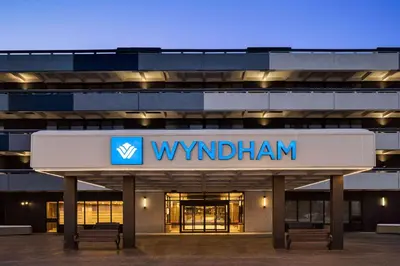 a building with the wydham sign on it at Wyndham Edmonton Hotel and Conference Centre in Edmonton