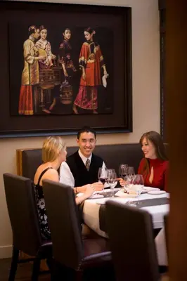 a group of people sitting around a table at Executive Hotel Vancouver Airport in Richmond