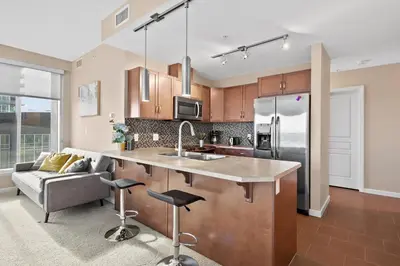 a kitchen with a sink and a counter top at GlobalStay Downtown Calgary Condos in Calgary