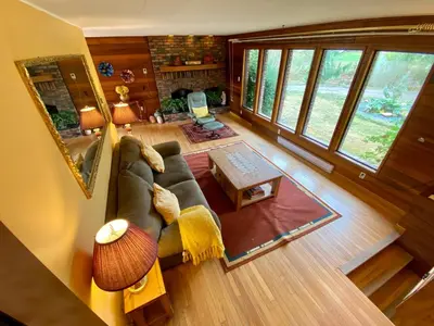 an overhead view of a living room with a couch at The Country Barn in Port Alberni