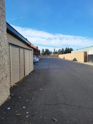 an empty parking lot next to a building at Super 8 North Red Deer in Red Deer
