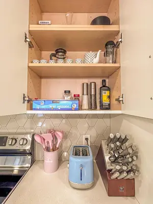 a kitchen counter with a toaster and other kitchen items at Skyline Getaway - Mountain Views - Pool - Hot Tub in Canmore