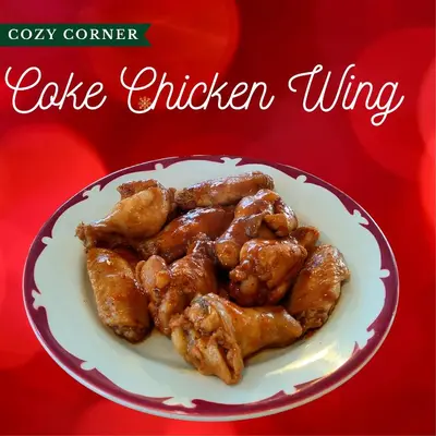 a plate of cody curry cake chicken wings at Cozy Corner Motel & Restaurant in Haines Junction