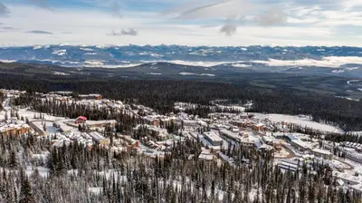an aerial view of a ski resort in the snow at Chalet Monashee - Brand New High-End Property with Amazing Views in Big White