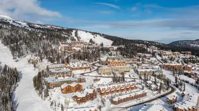 an aerial view of a resort in the snow at Chalet Monashee - Brand New High-End Property with Amazing Views in Big White