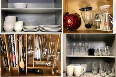 a kitchen cabinet with plates and utensils at 4 Bedrooms Suite Combo for Group of Families - Windtower Lodge in Canmore
