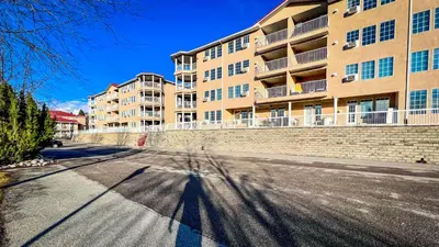 an empty street in front of a building at Mountain View Suites by StayIn in Fairmont Hot Springs