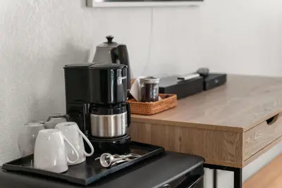 a coffee maker sitting on top of a counter at Kettle Valley Beach Resort in Penticton
