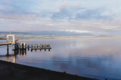 a dock on a large body of water at The Oceanfront Hotel in Sointula