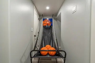 a hallway with two pumpkins on a shelf at The Saturday I Perfect for Families I Arcade Games in Sylvan Lake