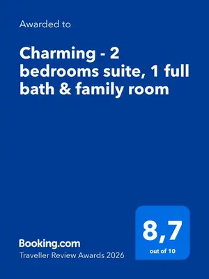 a screenshot of a cell phone with the text upgraded to champion bedrooms full at Charming - 2 bedrooms suite, 1 full bath & family room in Kamloops