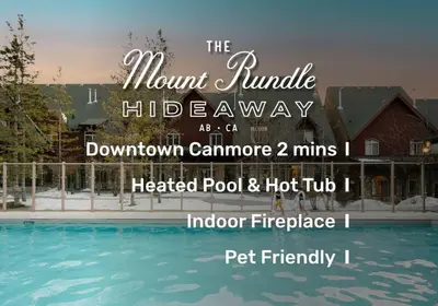 a sign for a house with a swimming pool at Mount Rundle Hideaway - Pool Hot Tub in Canmore