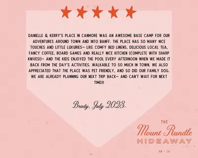 a letter with four stars on a pink envelope at Mount Rundle Hideaway - Pool Hot Tub in Canmore