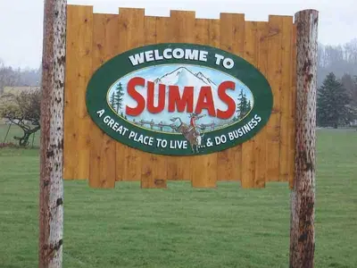 a sign for the welcome to summers sign on a fence at Charming, Cheerful, Exquisite 4 BR house, free wifi, free parking, free cancelation in Langley